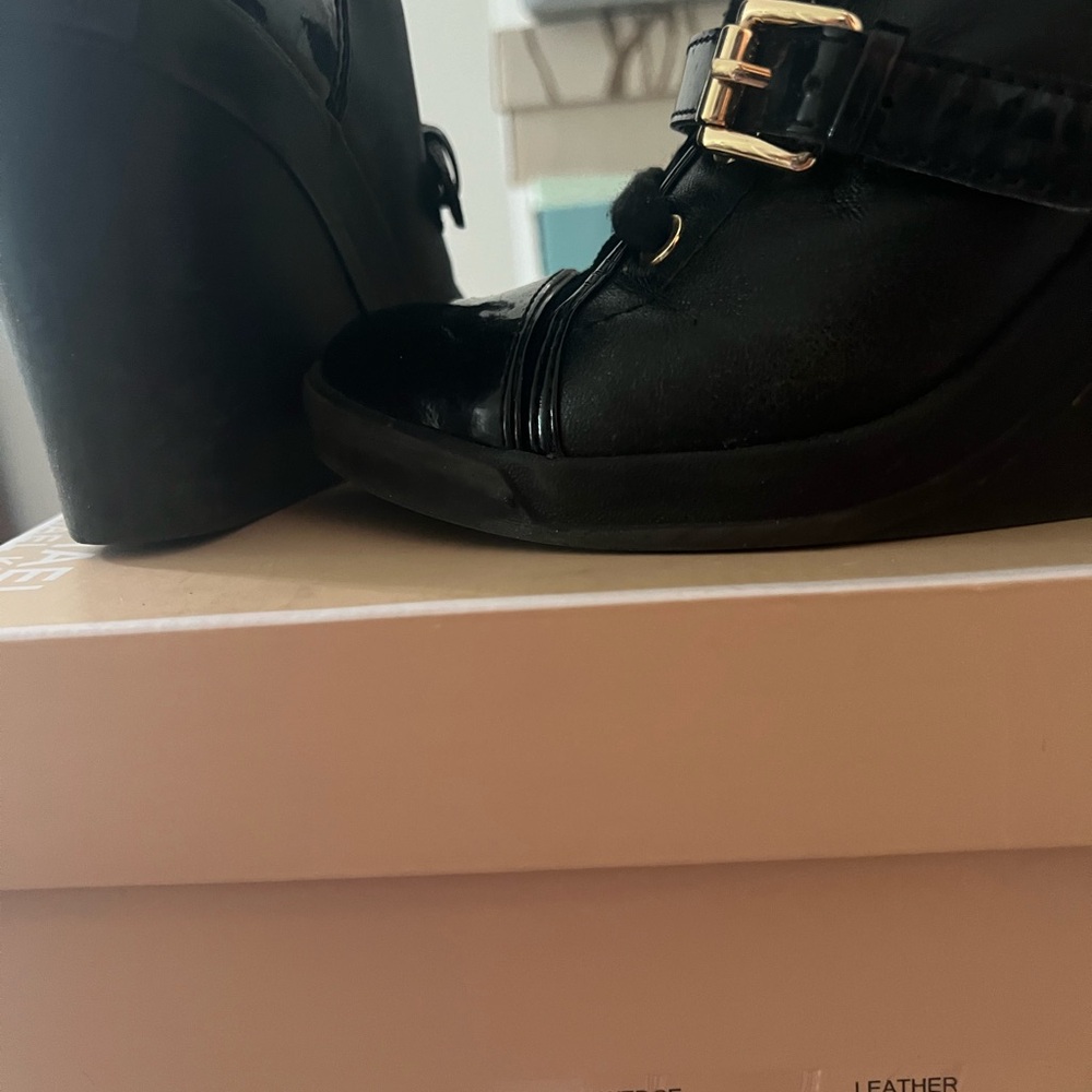 Michael Kors leather wedge boot. size 8 fits 7.5 lace up bootie with gold buckle